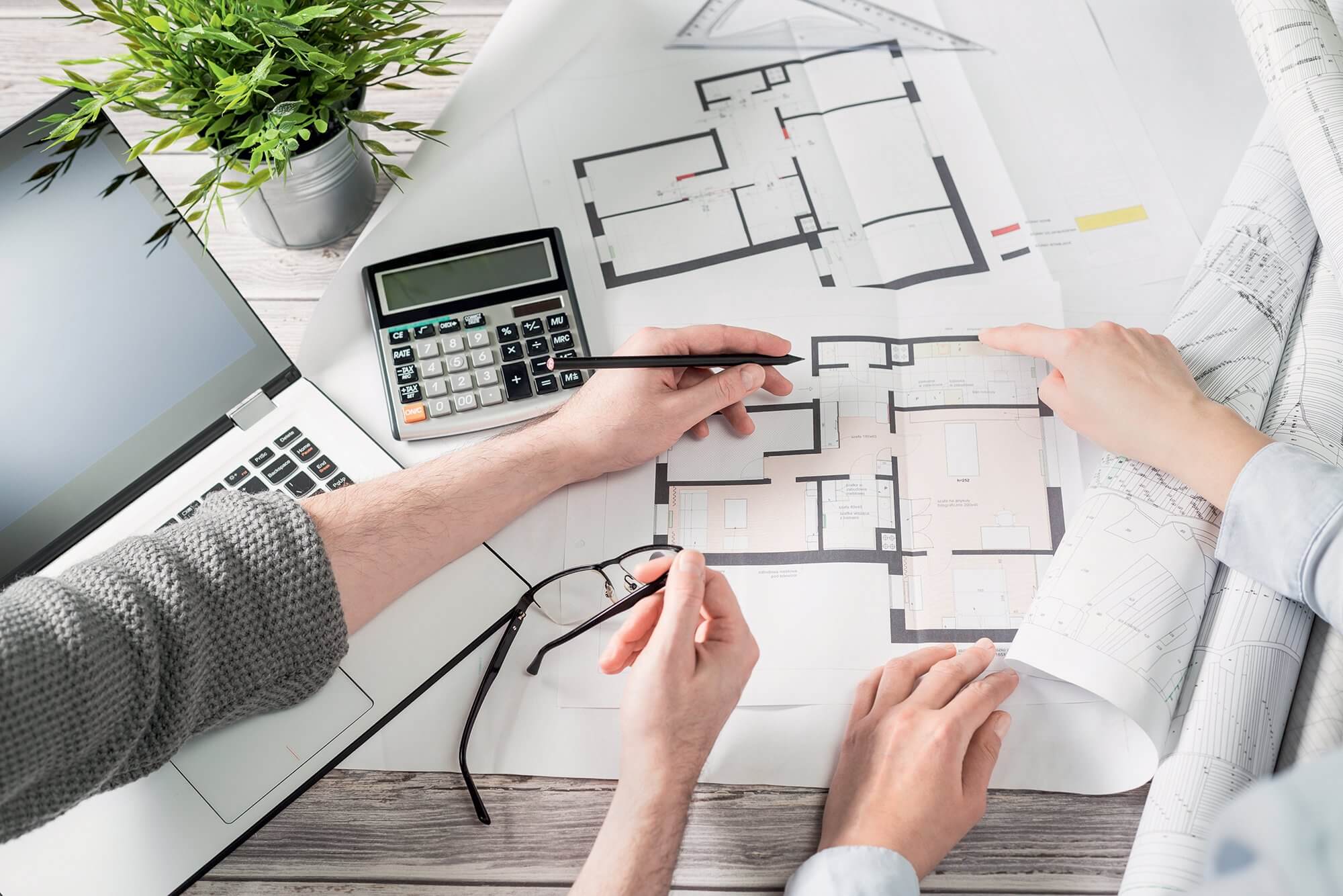 Quantity Surveyor reviewing project budget in London