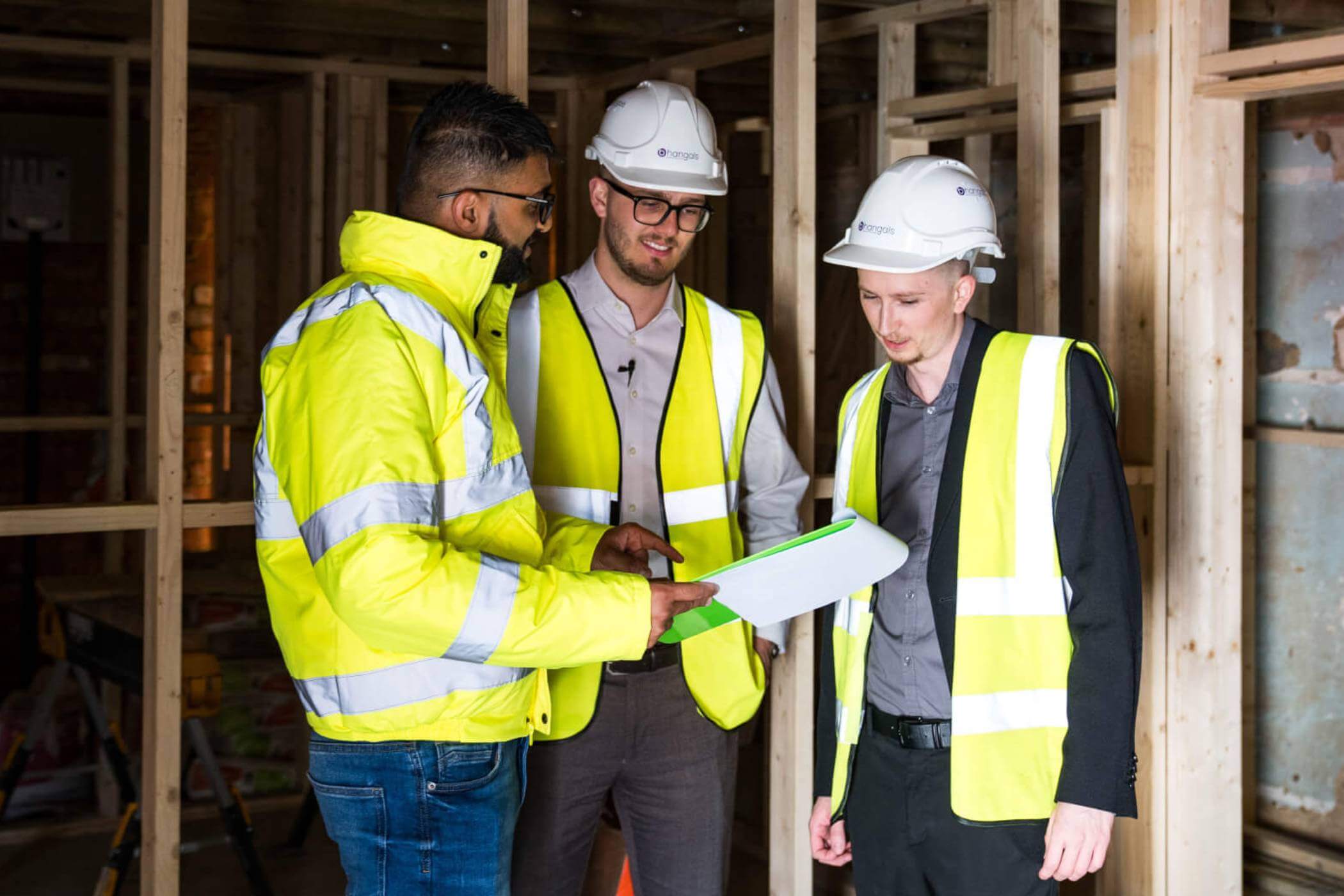 Quantity Surveyor conducting site measurement in London